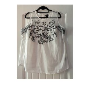 White blouse with black embroidered flowers